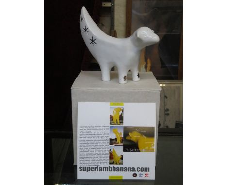 SUPERLAMBANANA - LIMITED EDITION "MERRY XMAS" WHITE CERAMIC MODEL BY BLU GNU, APPROXIMATELY 15cm HIGH