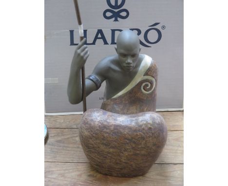 BOXED LLADRO GLAZED AND UNGLAZED CERAMIC FIGURE - AFRICAN MAN (AT FAULT)