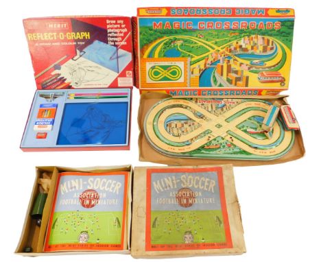 A Japanese Modern Toys Magic Crossroads tin windup set, together with two buses and a key, a Mini Series Mini Soccer game, bo