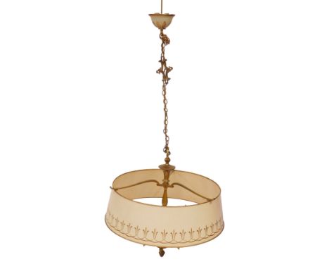 A 20thC brass six branch chandelier, each arm decorated with bird of prey head, surrounded with a painted metal shade in crea