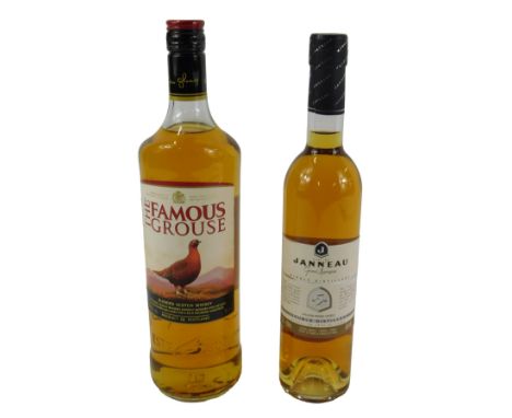 A bottle of The Famous Grouse blended Scotch Whisky, 1 litre, and a bottle of Janneau Grand Armagnac, 50cl. (2)