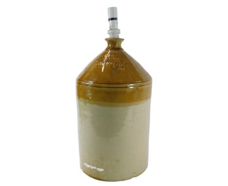 A Doulton Lambeth stoneware flagon for Rope Spirit Merchant Orford, later converted to a table lamp, 52cm high.WARNING! This 