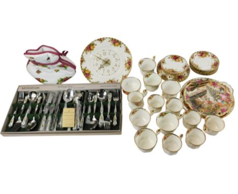 A group of Royal Albert Old Country Roses part tea wares, to include teacups and saucers, side plates, a quartz wall clock, t