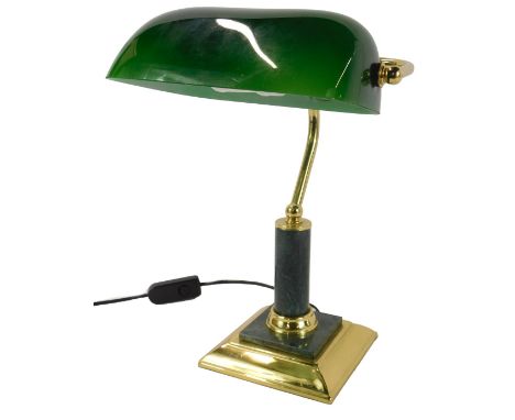 A 20thC brass desk lamp, with a green shade, on a green marble column and base, 35cm high.