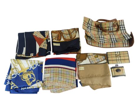 A group of Burberrys silk scarves, together with an unnamed silk scarf titled Cliquetis, decorated with military-related embl