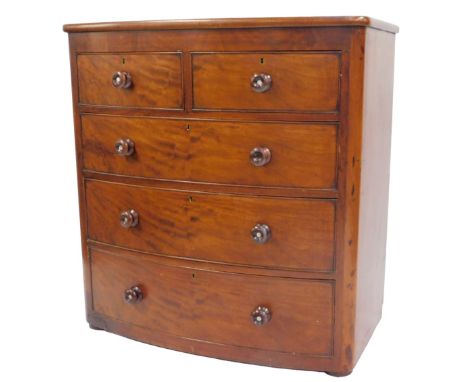 A Victorian mahogany bow front chest, the top with a rounded edge above two short over three long drawers, on bun feet, 110cm