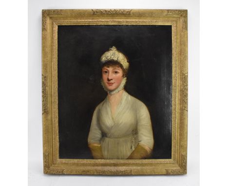 British School, 19th centurydepicting a half portrait of a seated lady, in the Regency fashion, with ruffled neck piece and m