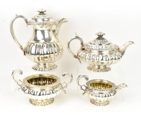 A George IV silver three piece tea service, with near matching silver coffee pot, the tea set by William Brown, London 1826, 