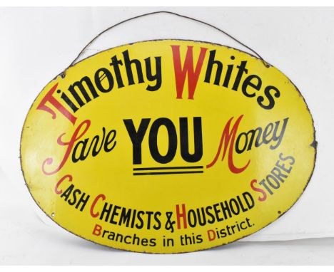 A Vintage 'Timothy Whites Cash Chemists and Household Stores' oval enamel sign, width 90cm, height 64cm 