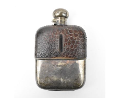 An Edwardian silver and leather mounted hip flask by The Alexander Clark Manufacturing Co, London 1907, the detachable silver