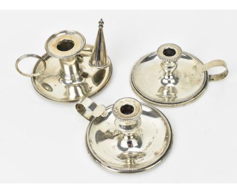 A George III silver miniature chamber stick by James Young, London 1790, with detachable snuffer, together with a near pair o