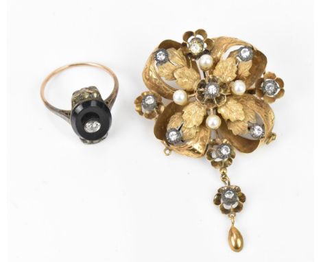 An Art Deco black onyx and diamond dress ring with central bezel set old cut diamond, size Q, together with a Victorian yello