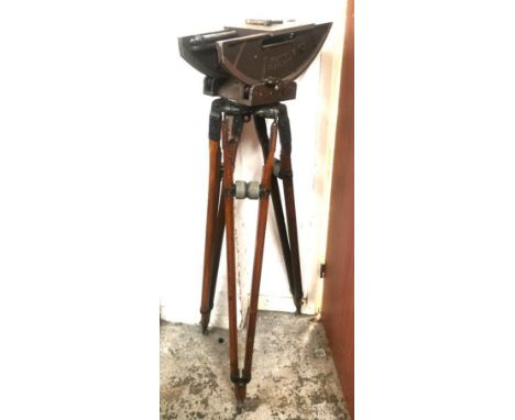 A Houston Fearless cine camera tripod head with a Moy fitting on a set of pre-war wooden tripod legs 