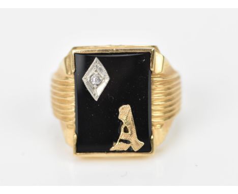 A 10ct yellow gold, onyx and diamond gentleman's signet ring, the plaque set with a diamond accent and a gold initial 'A', si