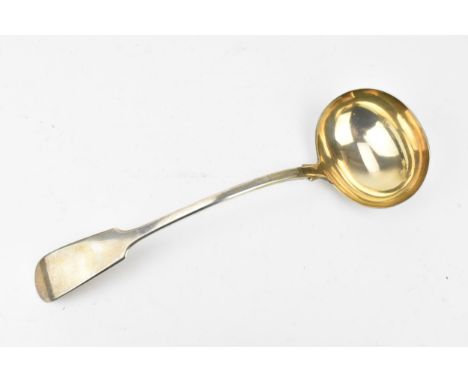 A George III silver soup ladle by John Walton, Newcastle 1813, in the fiddle pattern, 33 cm long, weight 283 grams 