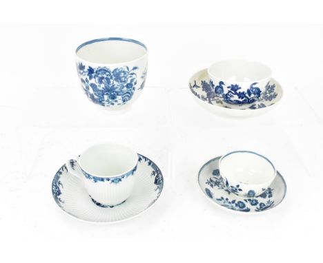 Two late 18th century Worcester blue and white tea bowls and saucers, one in the birds in branches pattern, the other in the 