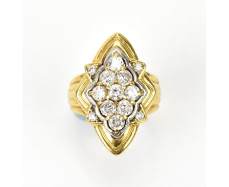 An 18ct yellow gold, platinum and diamond dress ring, set with nine diamond pattern brilliant cut same-sized diamonds, with a