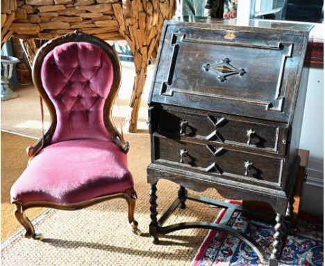 An Edwardian Jacobean style bureau on stand, plaque for 'Matthews limited furnishing, Gloucester' 61 cm x 38 cm d x 107 cm h 