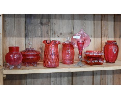 Seven pieces of Victorian and later cranberry glass, including Art Nouveau style pitcher plant vase 