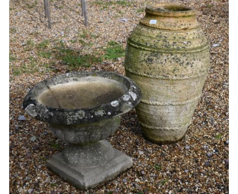 Omani terracotta date/olive jar and a stone planter (2) 