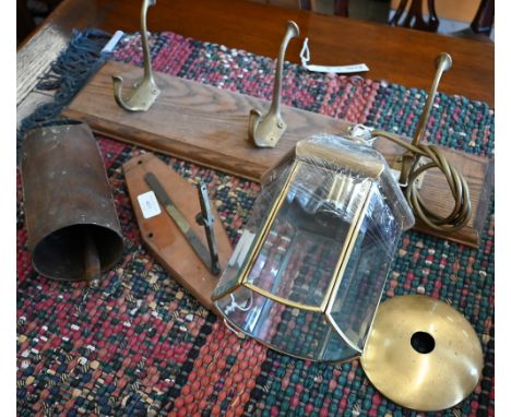 An oak framed Royal Artillery fire screen with armorial tapestry panel (glazed) to/w three brass double coat hooks on oak mou