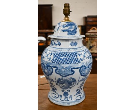 A modern blue and white ceramic baluster table lamp base in the Chinese manner, 47 cm high including fitting 