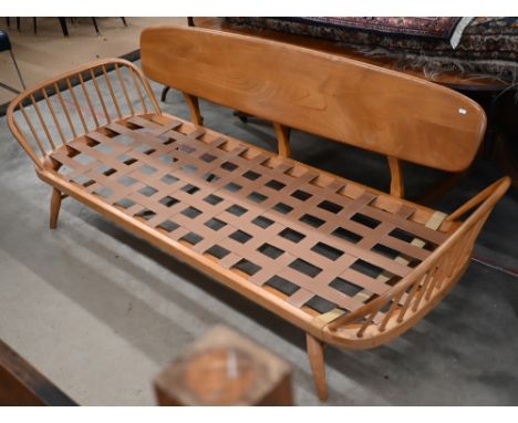 A mid-century Ercol elm and beech studio couch/day-bed (model 355), circa 1960s 