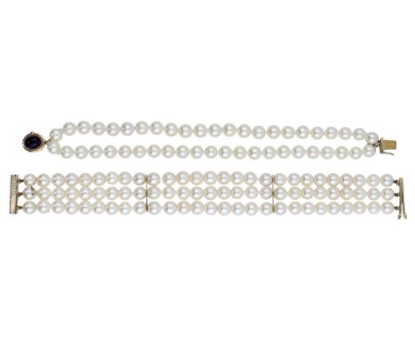 Two cultured pearl bracelets, the first comprising two uniform rows of cultured pearls terminating in a cabochon amethyst set