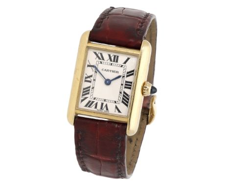 Cartier. A lady’s gold rectangular wristwatch, Ref. 2442, Tank, circa 2000. Movement: quartz, 4 jewels. Dial: silvered, Roman