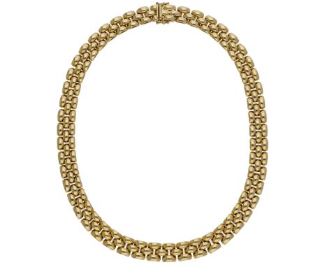 A brick-link necklace, designed as a continuous series of domed brick-links, stamped ‘750’, length 40.5cm. £1,500-£2,000  ---