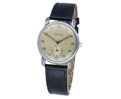 Breitling. A chrome plated and steel wristwatch, Ref. 156, circa 1950. Movement: manual winding, 15 jewels. Dial: silvered, A
