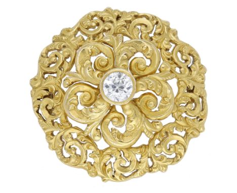 A 19th century diamond set brooch/pendant, of pierced scrollwork design, the central raised five petal flowerhead set with an