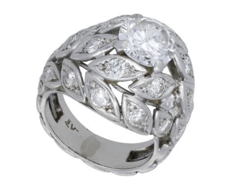 A diamond dress ring, of bombé form, the brilliant-cut diamond centred within a pierced diamond set foliate mount, principal 