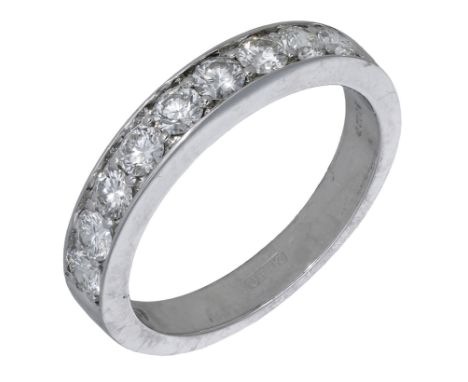 An 18ct white gold diamond half eternity ring, 2010, claw-set to the front with brilliant-cut diamonds, London hallmark, make