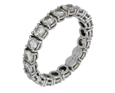 A platinum diamond eternity ring,1999, set throughout with brilliant-cut diamonds, London hallmark, total diamond weight appr