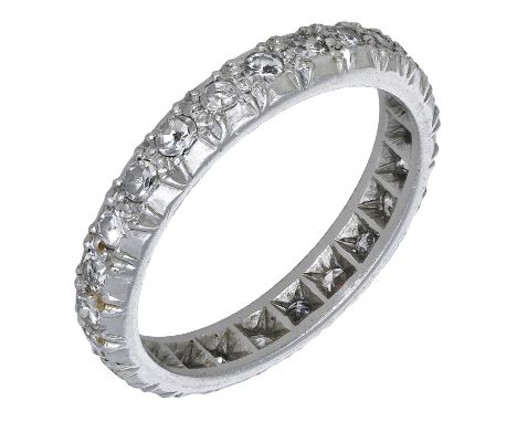 A diamond eternity ring, set throughout with single-cut diamonds, total diamond weight approximately 0.70 carat, ring size M.