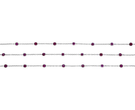 An 18ct white gold and ruby chain, spectacle-set throughout with circular-cut rubies spaced by cable-link white gold chain, s