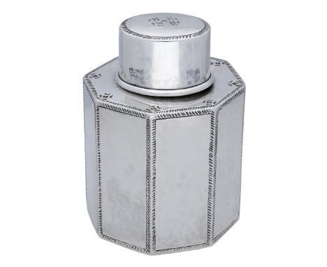 A George V silver octagonal tea caddy with pull off cover, with lightly planished, feather edged facets, shoulder and pull of