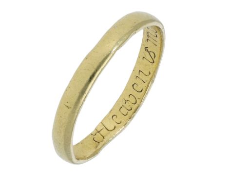 An 18th century gold posy ring, the plain gold band of D-section, inscribed to the interior ‘Heaven is my happynes’ in script