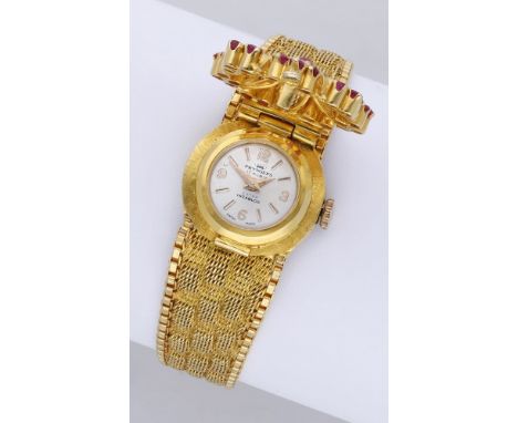 Pryngeps. A lady’s gold and gem-set bracelet with concealed watch, circa 1960 Movement: manual winding, 17 jewels. Dial: silv