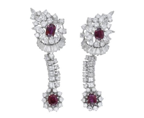 A pair of ruby and diamond ear clips, the tiered clusters set throughout with vari-cut diamonds and with an oval-cut ruby to 