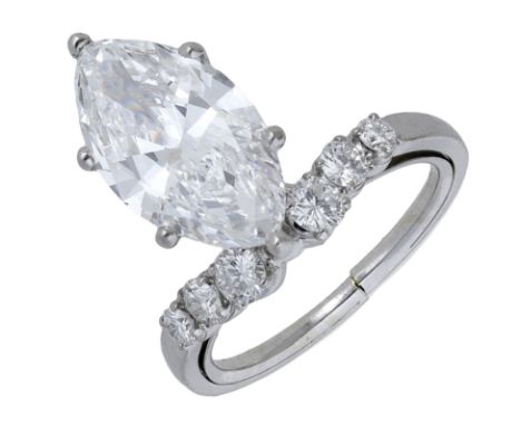 A diamond ring, the marquise-cut diamond, weighing 2.98 carats, between graduated brilliant-cut diamond shoulders, (base of b