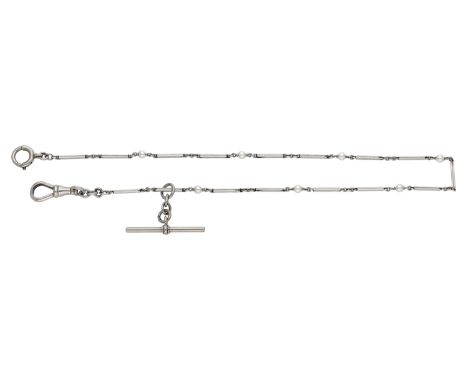 An early 20th century platinum and pearl chain, the reeded platinum batons spaced by seed pearls, with T-bar, swivel and bolt