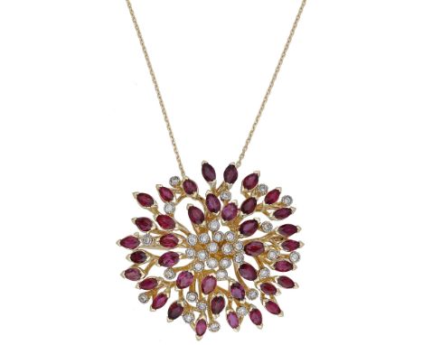 A ruby and diamond brooch/ pendant on chain, of foliate design, set throughout with a combination of marquise-cut rubies and 