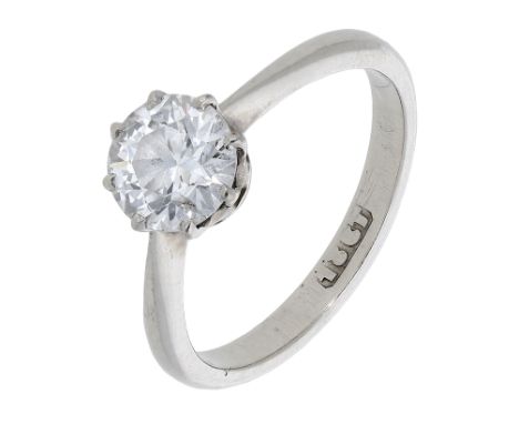 A diamond single stone ring, set with an old brilliant-cut diamond between tapered shoulders, stamped ‘18CT’, diamond weight 