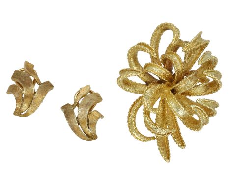 An abstract pendant and ear clip suite, the foliate spray pendant with pair of ear clips of conforming design, with textured 