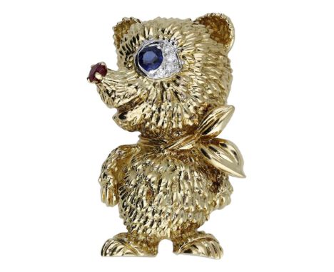 A novelty brooch by Kutchinsky, circa 1970, designed as a bear with circular-cut sapphire and brilliant-cut diamond eye and a