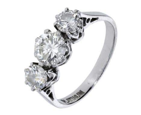 A diamond three stone ring, set with a graduated row of brilliant-cut diamonds, stamped ‘Platinum’, total diamond weight appr