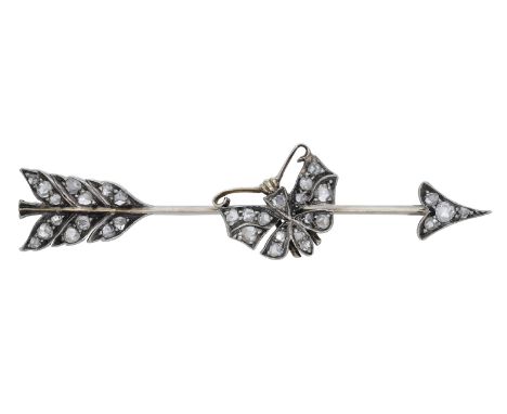 A late 19th century diamond brooch, designed as an arrow with a butterfly to the centre, set throughout with rose-cut diamond