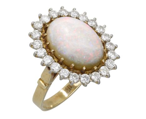 An opal and diamond cluster ring, the opal cabochon claw-set within a surround of brilliant-cut diamonds, total diamond weigh